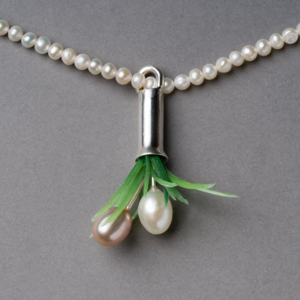 Silver and pearl flower vase necklace