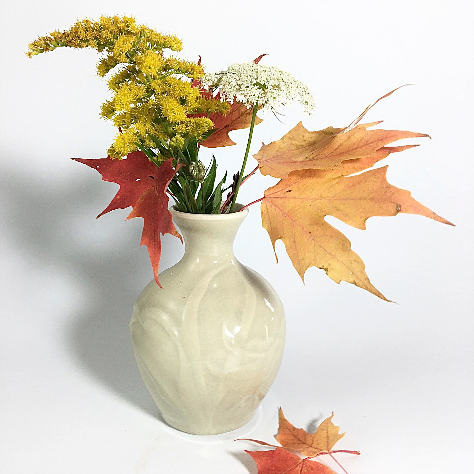 Porcelain vase with lilies and clair de lune glaze