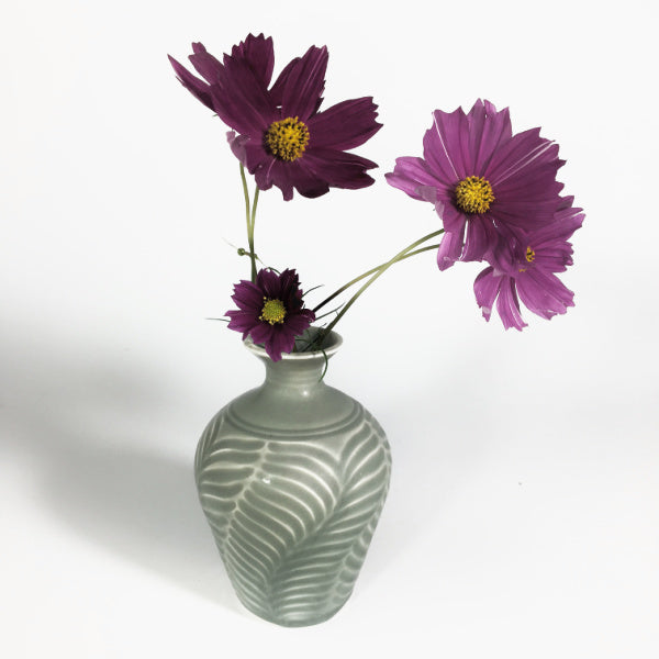 Porcelain wave vase with celadon glaze